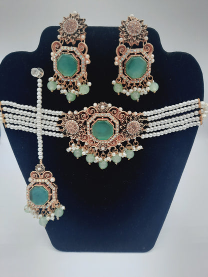 Anarkali Zircon choker set with guluband earrings and teeka in green color - NATASHAHS