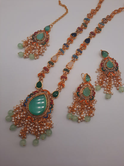 Noratan Kundan maala set with earrings and teeka for modern brides in black and green shades - NATASHAHS