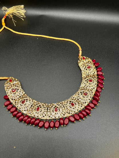KUNDAN RED PEARLS & STONES GOLD-BASED EARRINGS WITH KUNDAN WORK CHOKER HYDERABADI STYLE JEWELRY SET - NATASHAHS